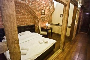 Posteľ alebo postele v izbe v ubytovaní Apartamenty Chleb i Wino Toruń