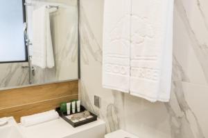 Uma casa de banho em Eco Tree Hotel Causeway Bay