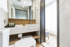 Uma casa de banho em Eco Tree Hotel Causeway Bay