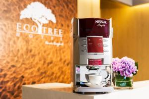 Příslušenství pro přípravu čaje a kávy v ubytování Eco Tree Hotel Causeway Bay