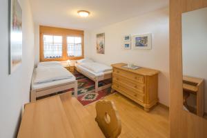 Una cama o camas en una habitación de Beatrice