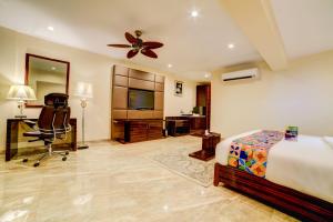 Fabhotel Prime Sarala Crown - 500M From Calangute Beach客房内的一张或多张床位