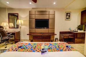 Fabhotel Prime Sarala Crown - 500M From Calangute Beach客房内的一张或多张床位