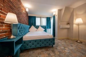Postel nebo postele na pokoji v ubytování Hotel Casa Fiori