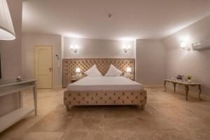 Postel nebo postele na pokoji v ubytování Hotel Casa Fiori