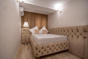 Postel nebo postele na pokoji v ubytování Hotel Casa Fiori