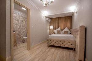 Postel nebo postele na pokoji v ubytování Hotel Casa Fiori