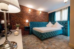 Postel nebo postele na pokoji v ubytování Hotel Casa Fiori