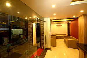 Χώρος καθιστικού στο The Milestone Hotel