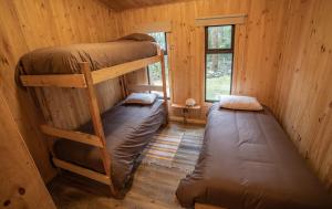 Postel nebo postele na pokoji v ubytování La Escondida Pucon + 37 fotografií