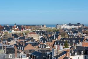 an aerial view of a city with houses at Villa Médicis Trouville-sur-mer in Trouville-sur-Mer