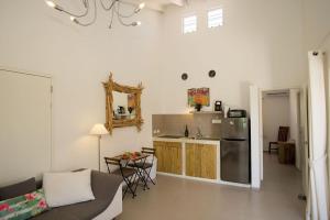 Kuchyň nebo kuchyňský kout v ubytování Appartement Kas Wahoo at Sabal Palm Villas