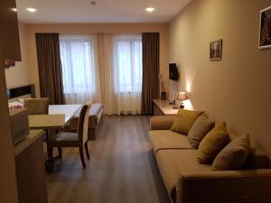 TV a/nebo společenská místnost v ubytování Sweet Apartment New Gudauri suites