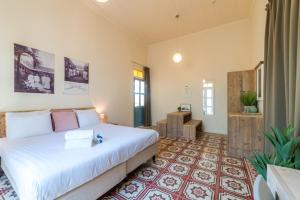 Łóżko lub łóżka w pokoju w obiekcie Boutique Hotel 't Klooster