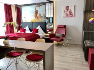 Uma área de estar em Star Apart Hotel Sachsenhausen