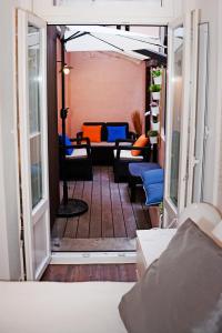 a view of a room with chairs and tables at Fullest Apartments in Lisbon