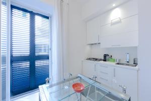 Kuchyňa alebo kuchynka v ubytovaní Boutique House Fiò + 22 fotografií
