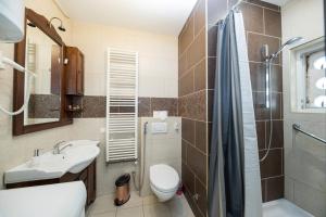 Koupelna v ubytování Apartments Agape