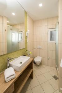 Koupelna v ubytování Apartments Agape