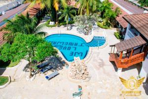 an overhead view of a swimming pool at a resort at Jangwani Sea Breeze Resort in Dar es Salaam