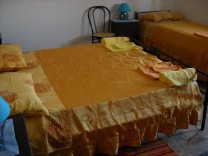 Postel nebo postele na pokoji v ubytování Casa Aurora
