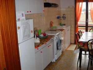 Kuchyň nebo kuchyňský kout v ubytování Casa Aurora + 9 fotografií