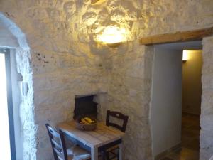TV a/nebo společenská místnost v ubytování Trulli & Grotte Exclusive House