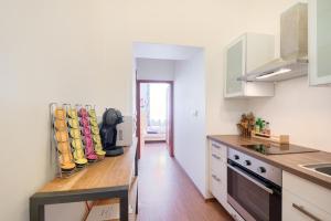Kuchyňa alebo kuchynka v ubytovaní Paradise Apartment