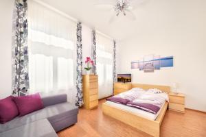 Posteľ alebo postele v izbe v ubytovaní Paradise Apartment