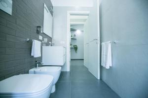 Koupelna v ubytování Benvenuti al Sud Naples + 18 fotografií