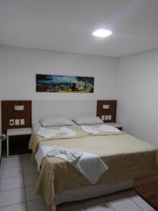 Voodi või voodid majutusasutuse Pipa´s Ocean Flat toas