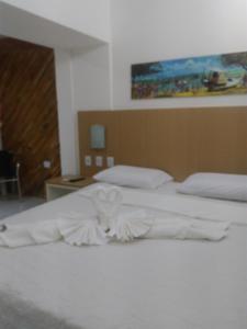 Voodi või voodid majutusasutuse Pipa´s Ocean Flat toas