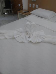 Voodi või voodid majutusasutuse Pipa´s Ocean Flat toas