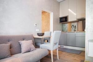 Kuchyňa alebo kuchynka v ubytovaní Citylux Apartments