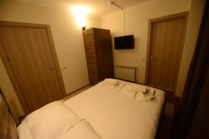 Postel nebo postele na pokoji v ubytování Hotel Aristocrat Batumi