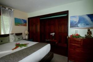 Postel nebo postele na pokoji v ubytování Kalani Hawaii Private Lodging