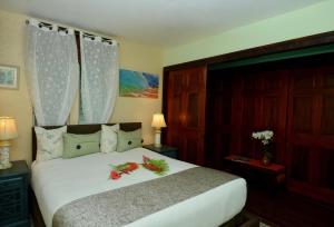 Postel nebo postele na pokoji v ubytování Kalani Hawaii Private Lodging