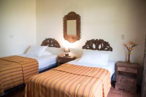 
A bed or beds in a room at VILLAS JUCANYA Super Higienizadas
