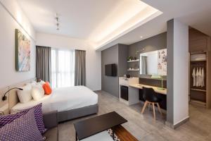 Ένα ή περισσότερα κρεβάτια σε δωμάτιο στο The Canvas Hotel