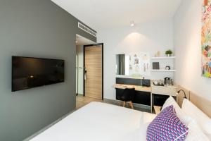 Η κουζίνα ή μικρή κουζίνα στο The Canvas Hotel