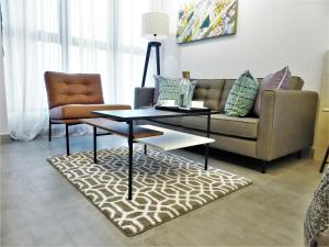 Χώρος καθιστικού στο The Canvas Hotel