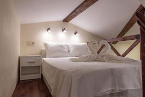 Llit o llits en una habitació de Central Loft