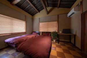 Letto o letti in una camera di こんぴら町家 Konpira Machiya