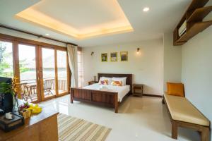 Anyamanee Resort客房内的一张或多张床位