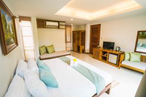 Anyamanee Resort客房内的一张或多张床位