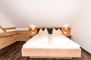 Postel nebo postele na pokoji v ubytování Ferienparadies Wiesenbauer