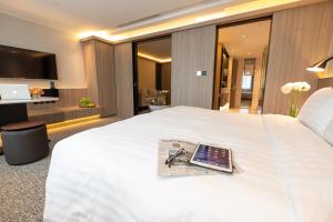 Uma cama ou camas num quarto em Nathan Hotel