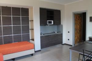 Kuchyň nebo kuchyňský kout v ubytování Hotel Residence Aurora