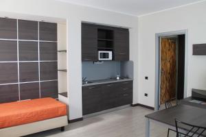 Kuchyň nebo kuchyňský kout v ubytování Hotel Residence Aurora