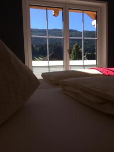 Postel nebo postele na pokoji v ubytování Ferienhaus Wind
